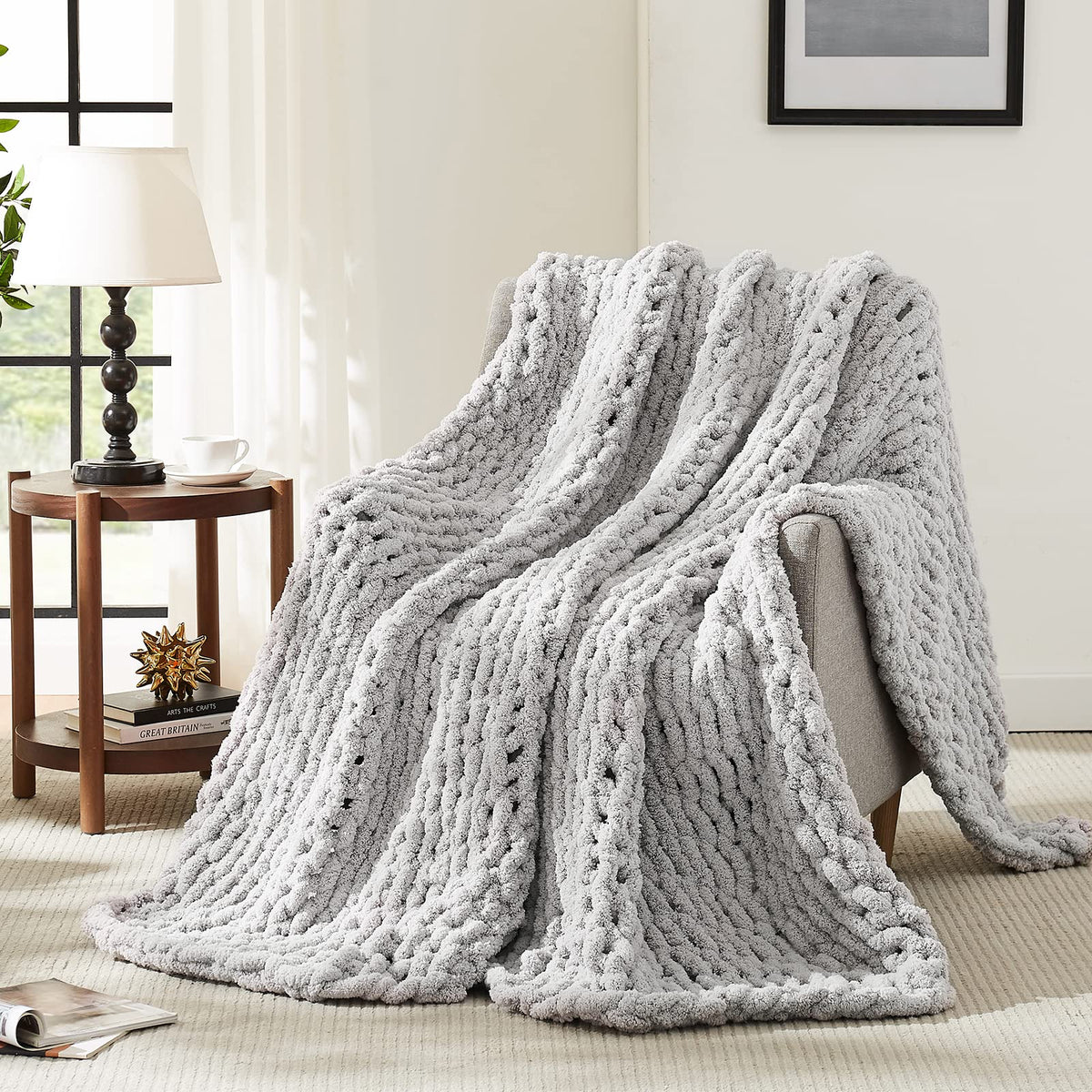 L'AGRATY front view of grey chunky knit throw showing blanket look and cozy appeal