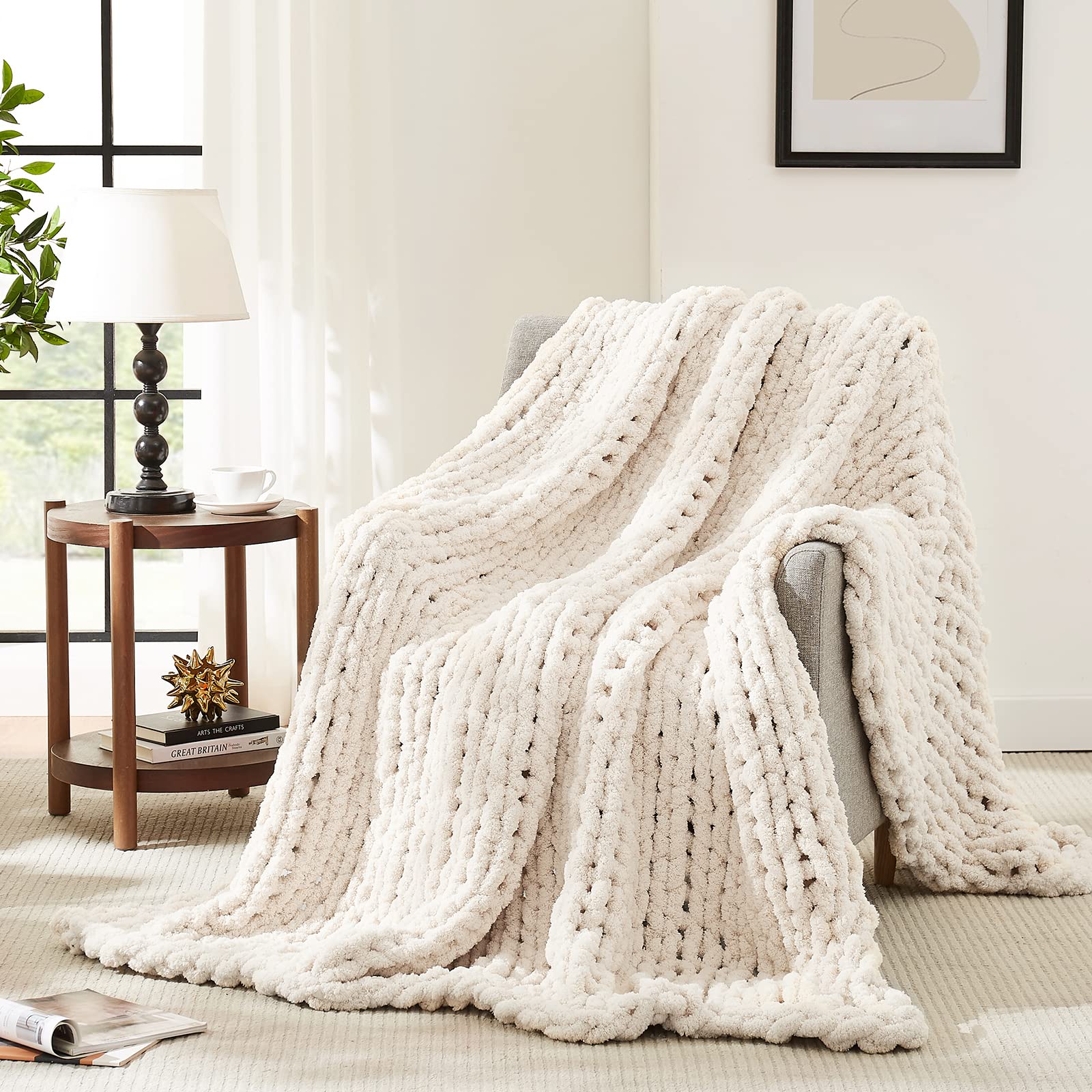 L'AGRATY front view of ivory chunky knit throw showing cozy look