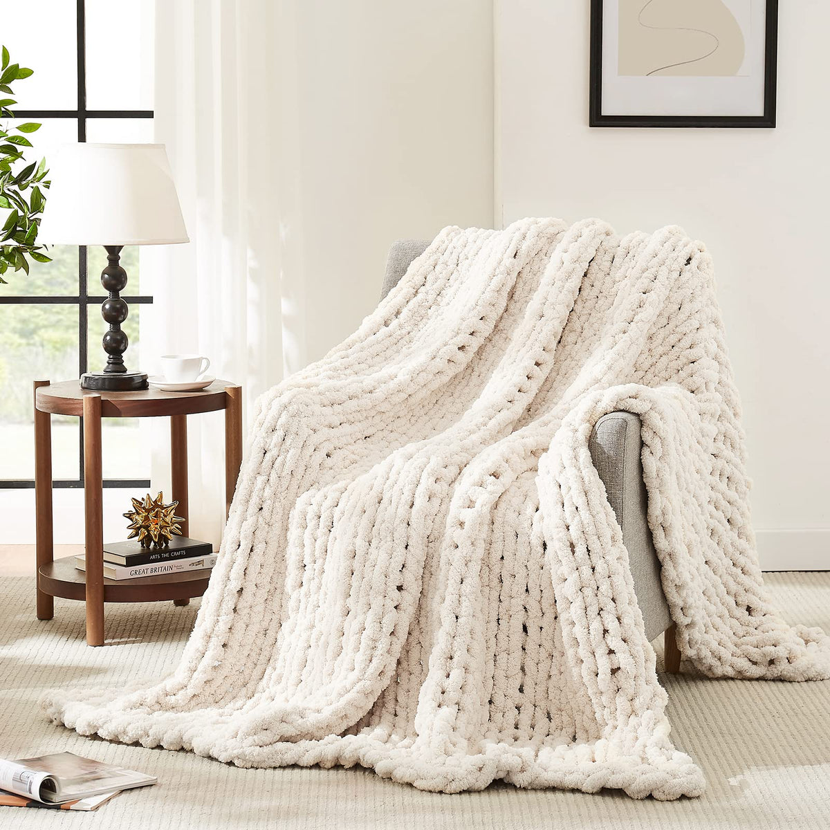 L'AGRATY front view of ivory chunky knit throw showing cozy look