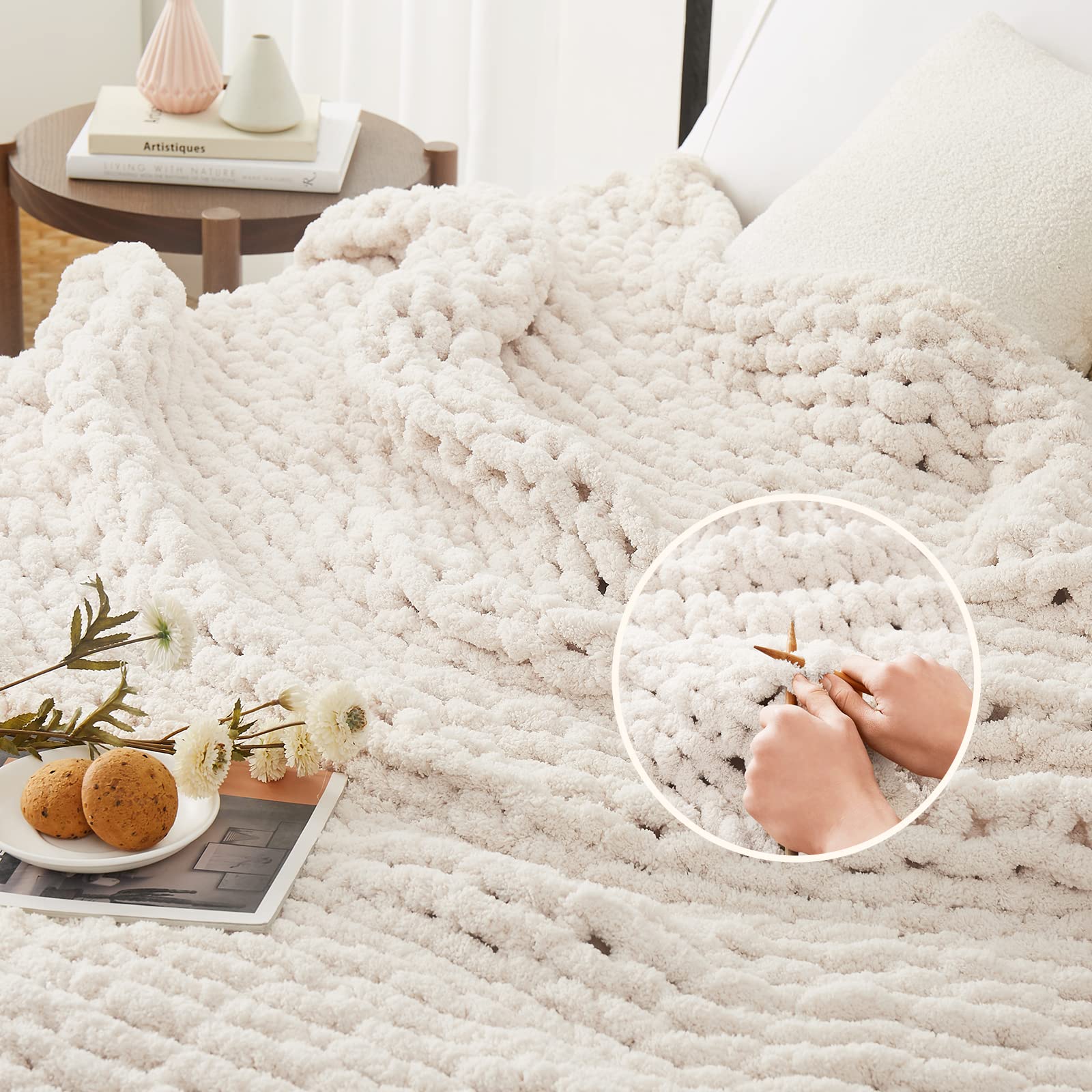 L'AGRATY throw on couch lifestyle shot showing warm styling benefit