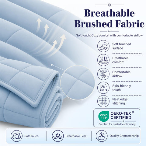 L'AGRATY model using blanket on couch showing calming comfort for relaxation