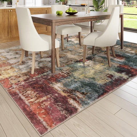 Lahome rug next to sofa showing 9x12 scale and furniture compatibility benefit