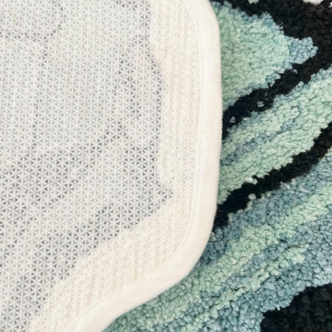 LAKEA rug placed in bedroom adding fun accent and cozy comfort