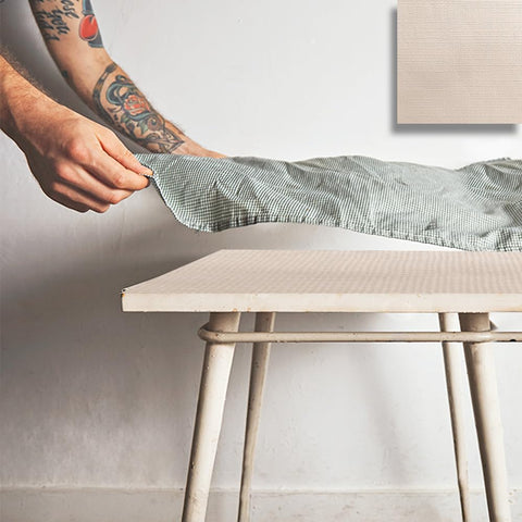 LAMINET used under tablecloth for elegant drape and protection