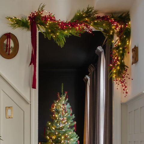 LampLust garland draped over mantel demonstrating cozy accent lighting and style