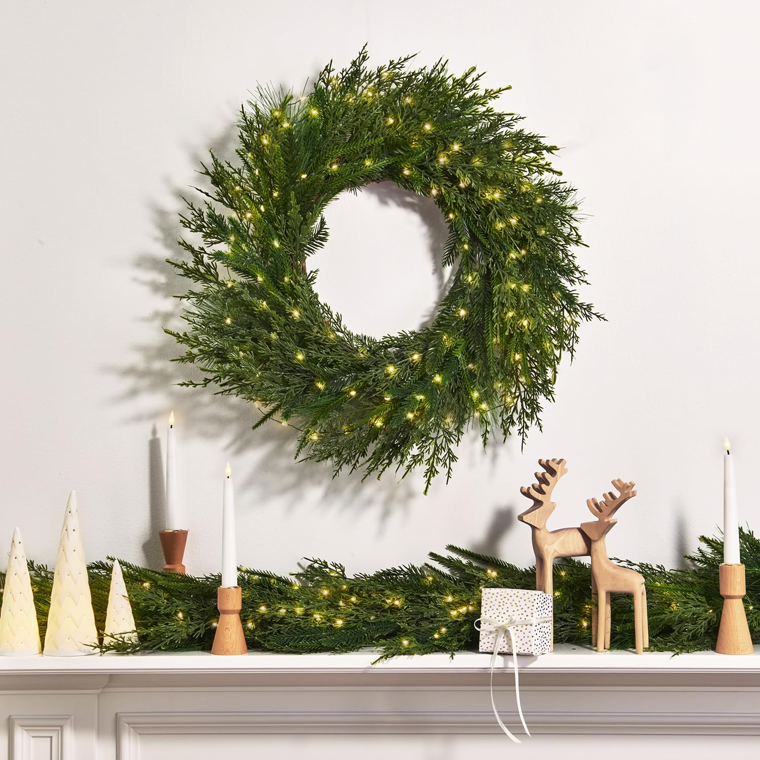 LampLust garland wrapped on staircase bannister showing easy installation and charm