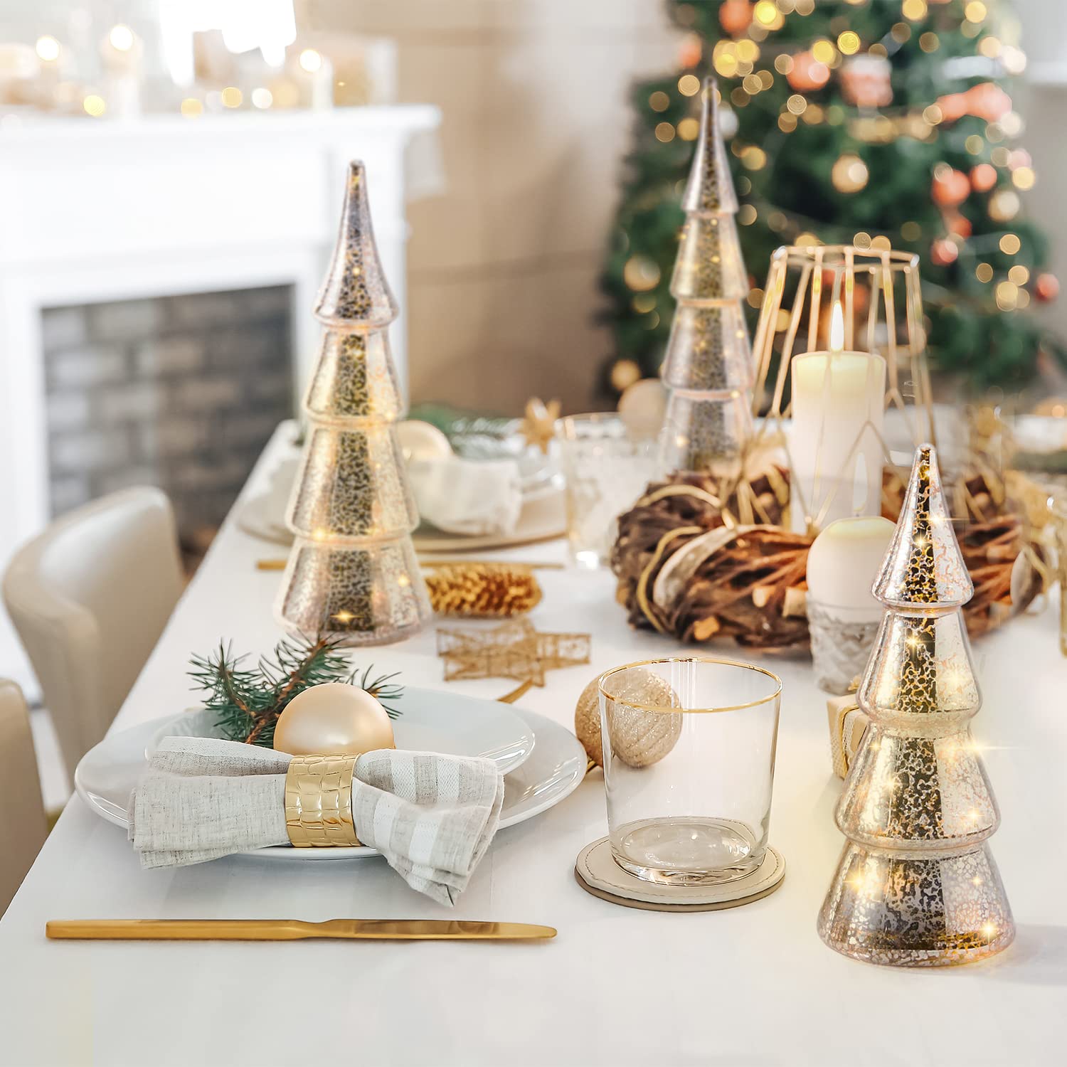LampLust trees in holiday table centerpiece creating festive focal point