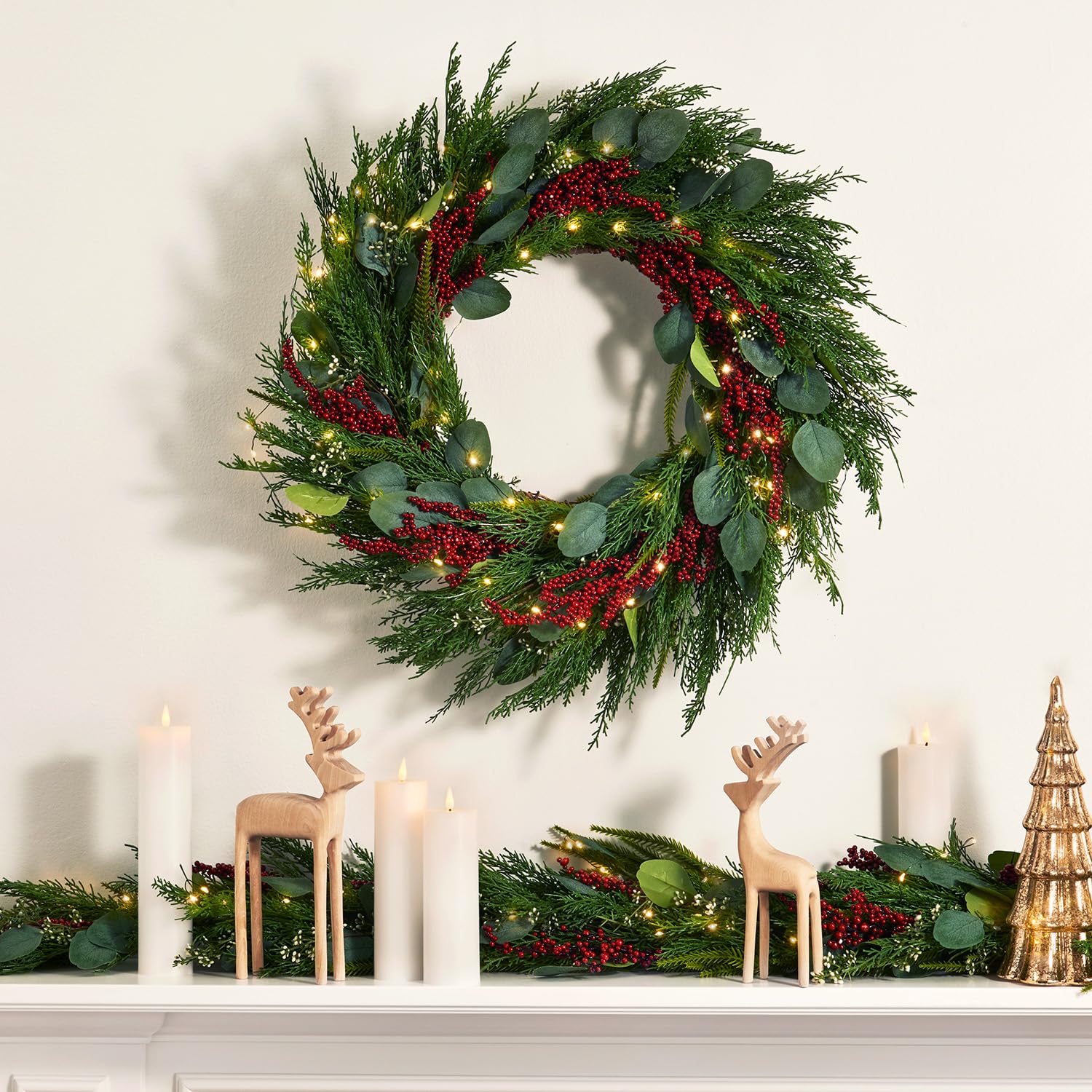 LampLust garland held in hand for scale, demonstrates flexible size