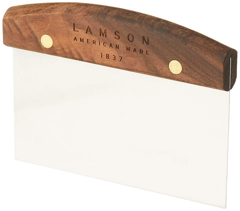 Lamson scraper cutting sticky dough cleanly to portion sourdough loaf
