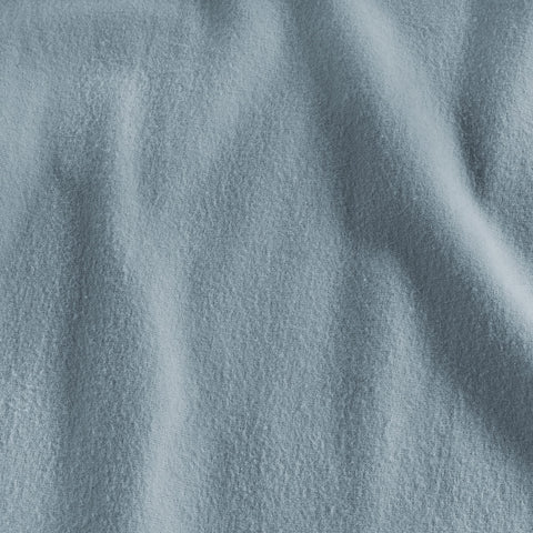 LANE LINEN styled bedroom with sheets on bed illustrating cozy, inviting aesthetic
