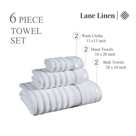 LANE LINEN folded towels on bathroom shelf conveying tidy storage and style