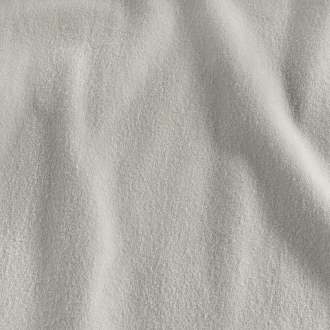 LANE LINEN fitted sheet on mattress to show secure stay-in-place fit