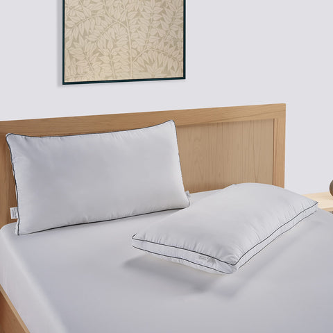 LANE LINEN pillow in washing machine showing easy-care washable convenience