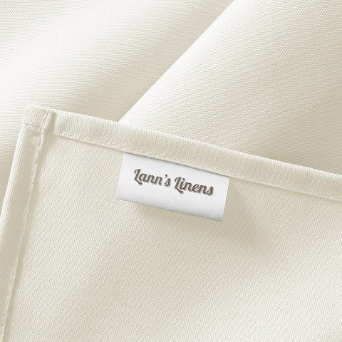 Lann's Linens folded tablecloth showing compact storage and reusable benefit