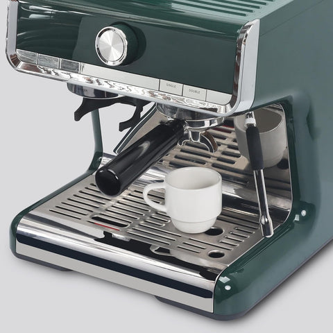 Lareina cup held in hand to show scale and comfortable grip for espresso