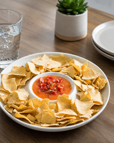 LAUCHUH platter on counter beside utensils showing size and scale
