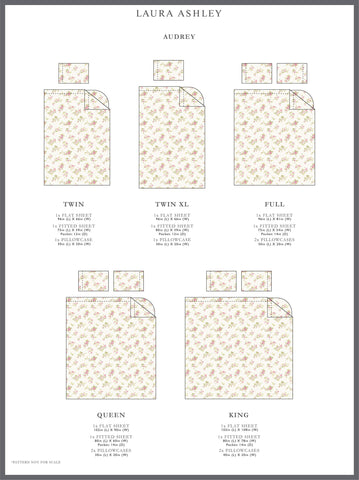 Laura Ashley Audrey Pink styled on a bed in a cottage room benefit: adds timeless floral charm