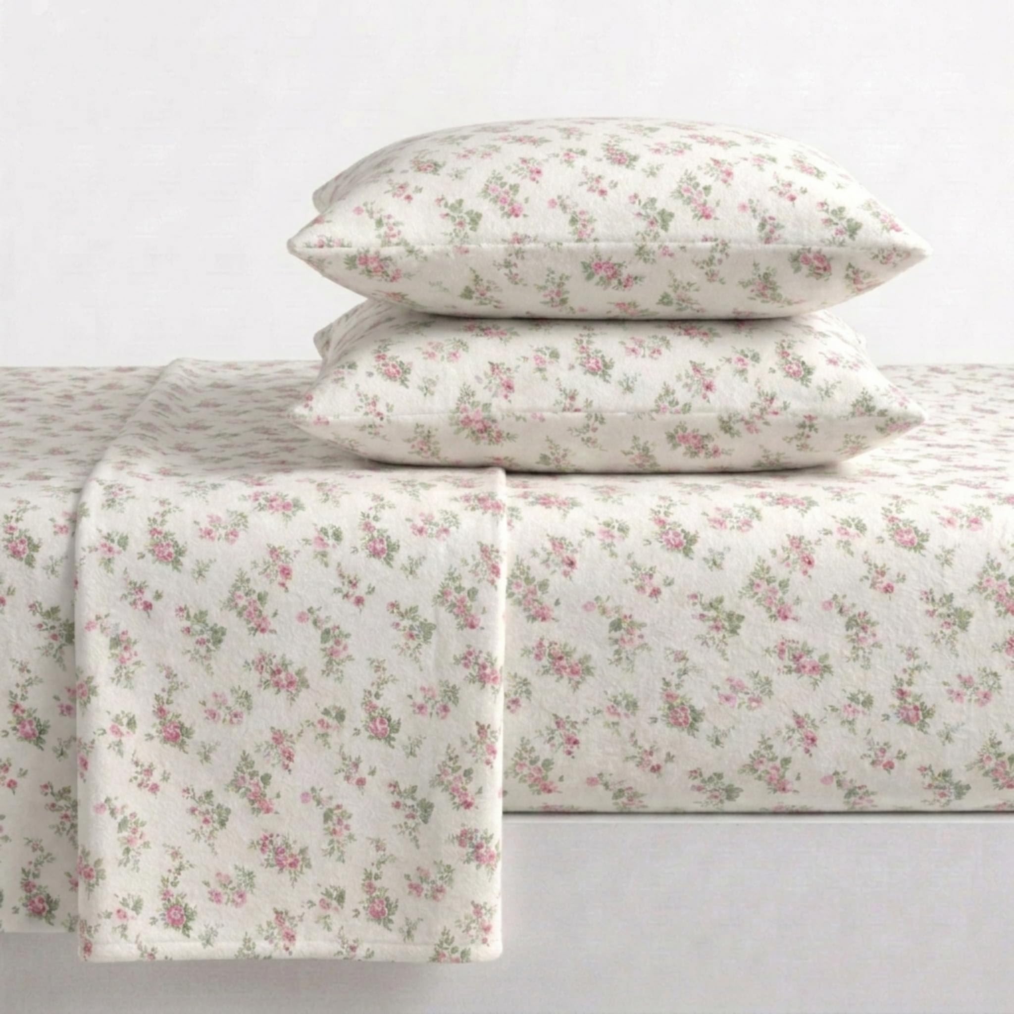 Laura Ashley twin bed made with Audrey Pink sheets showing neat fit and warm appearance