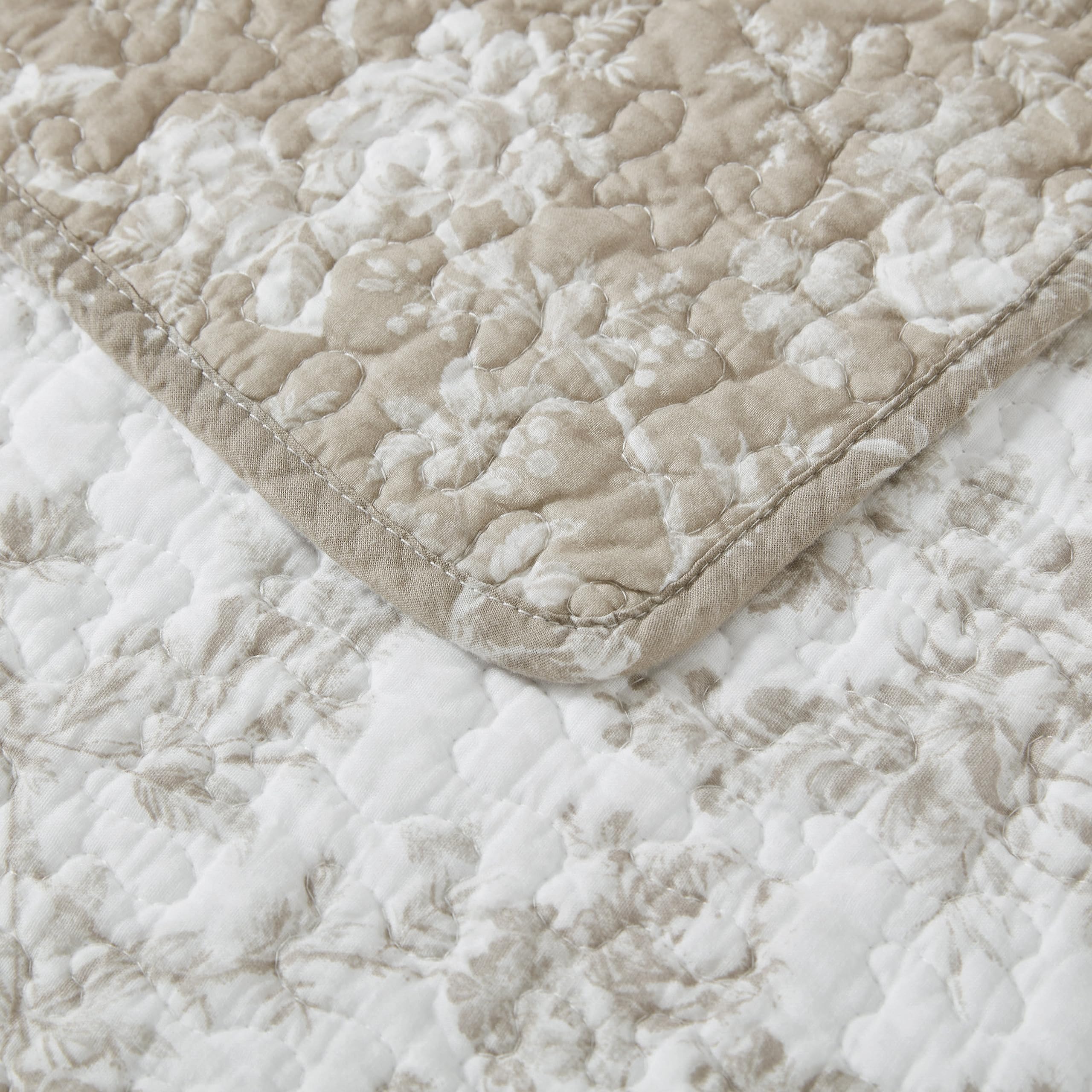 Laura Ashley quilt on bed styled lifestyle displaying room transformation