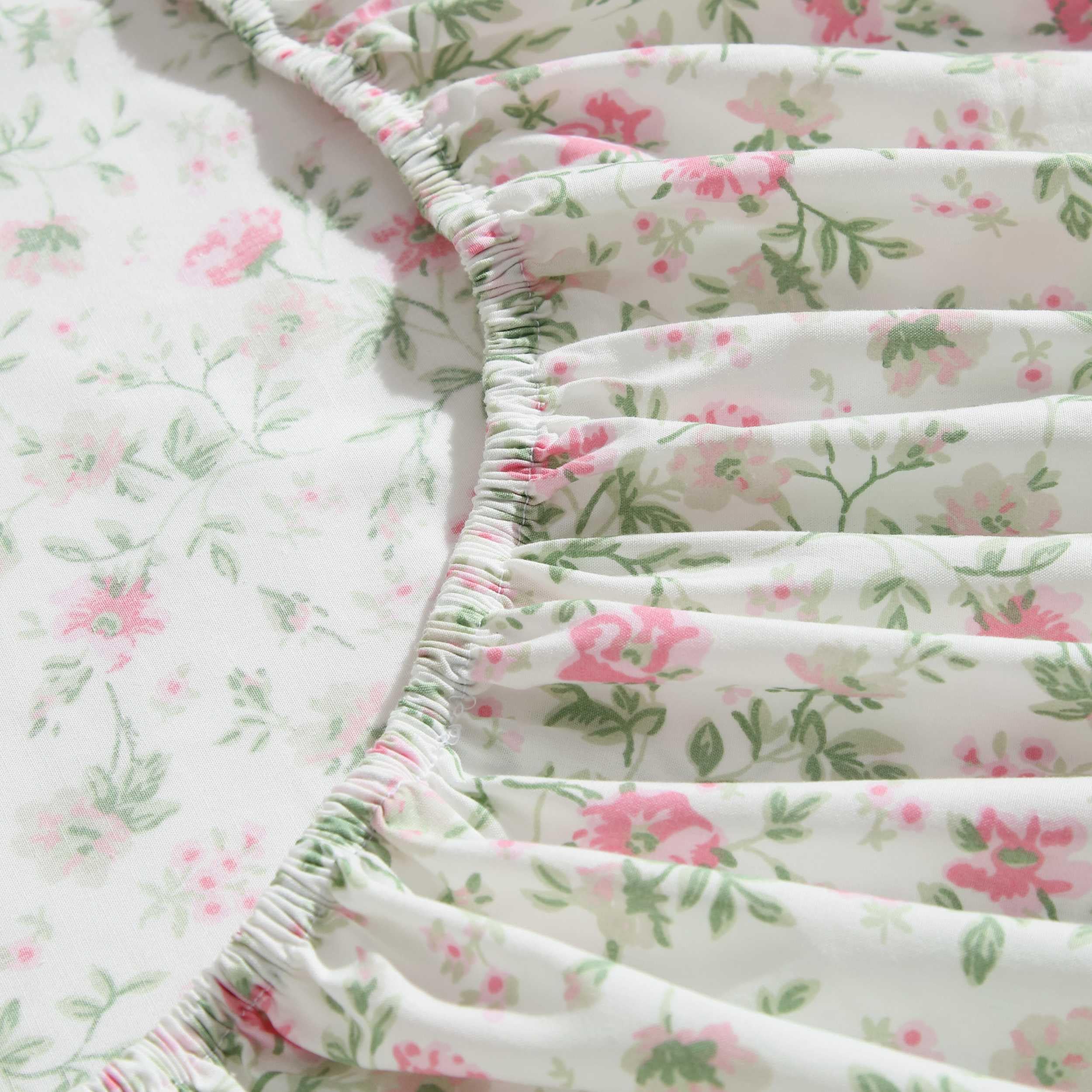 Laura Ashley pillowcase detail highlighting floral print and smooth percale finish