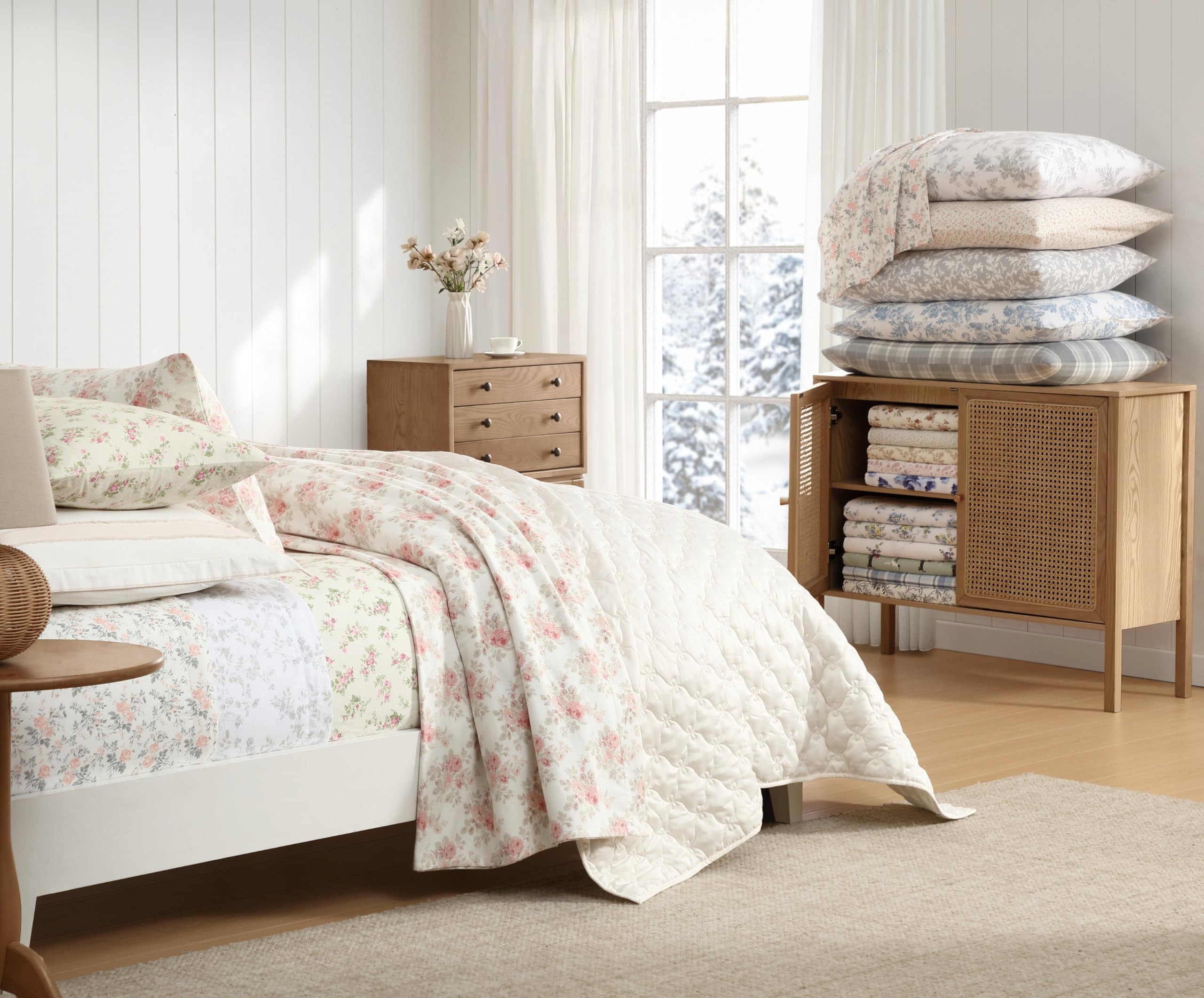 Laura Ashley corner tuck demonstration on mattress, shows secure fit benefit