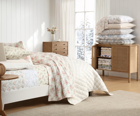 Laura Ashley corner tuck demonstration on mattress, shows secure fit benefit