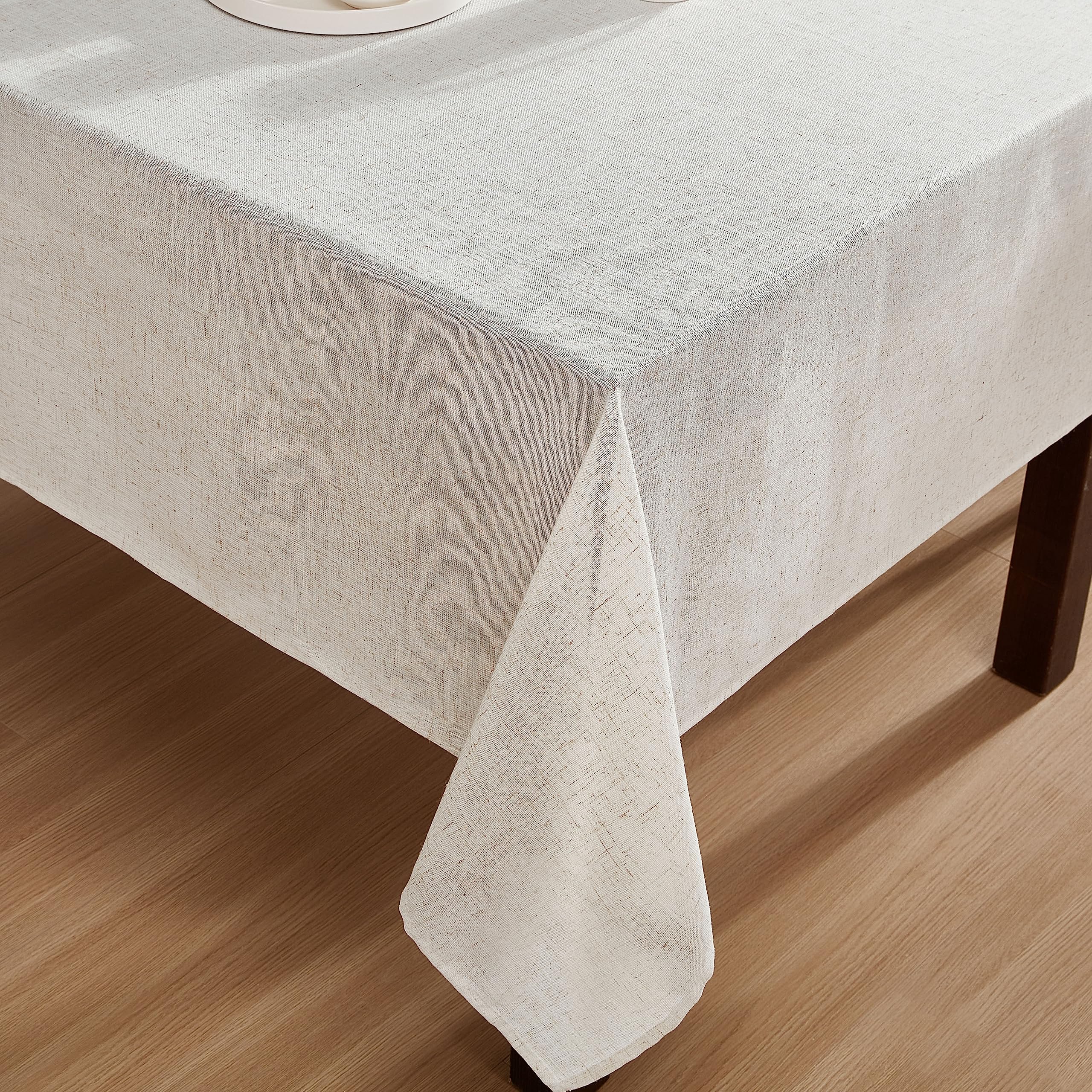 Folded Laura Ashley Dothan tablecloth ready for storage showing easy care convenience