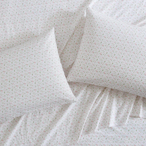 Laura Ashley Evie Pink fitted sheet elastic edge shown for secure fit