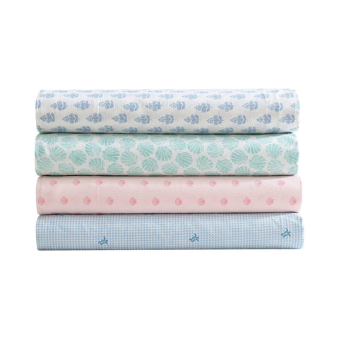 Laura Ashley Francesca Blue on mattress showing deep-pocket fit and scale