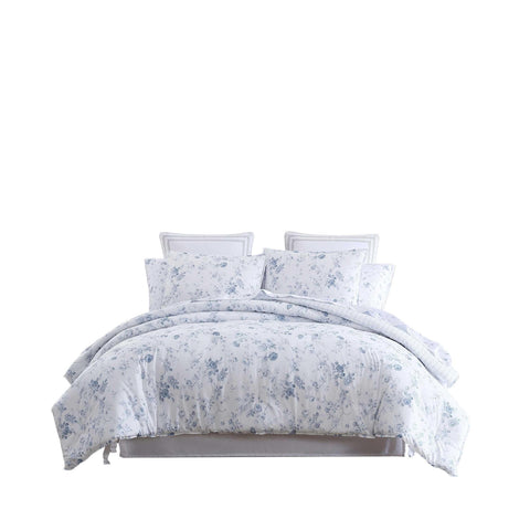 Laura Ashley styled bed in dorm room demonstrating space-saving decor benefit