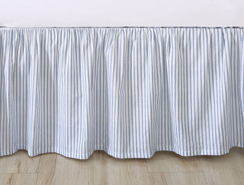 Laura Ashley bedskirt in use on a styled queen bed showing concealed under-bed storage