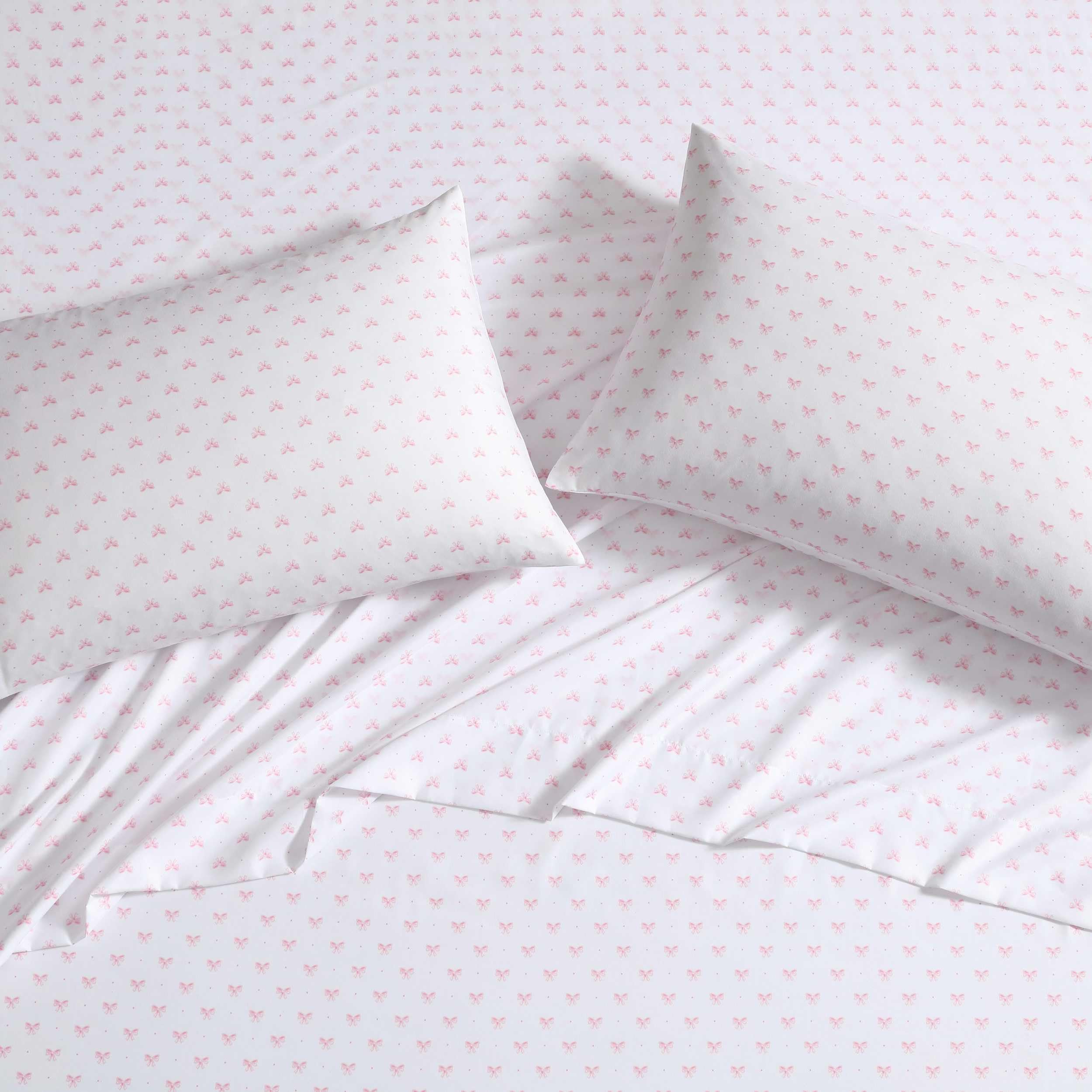 lifestyle image of Laura Ashley sheets on Twin XL bed showcasing styled room and cozy appeal
