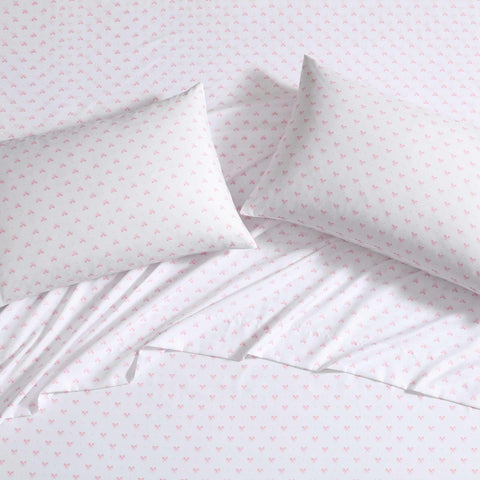 lifestyle image of Laura Ashley sheets on Twin XL bed showcasing styled room and cozy appeal