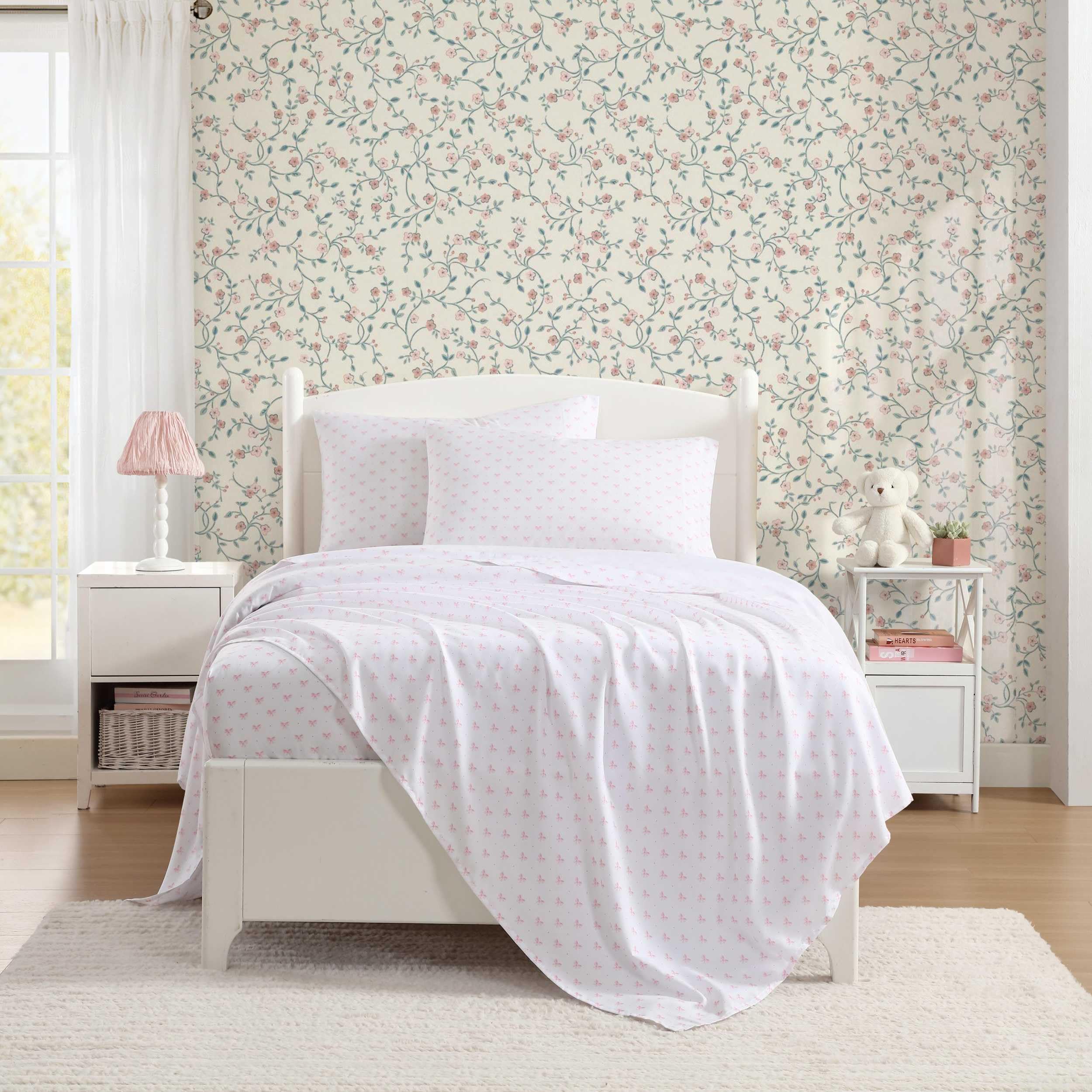 size comparison graphic of Laura Ashley Twin versus Twin XL sheets showing extended length benefit