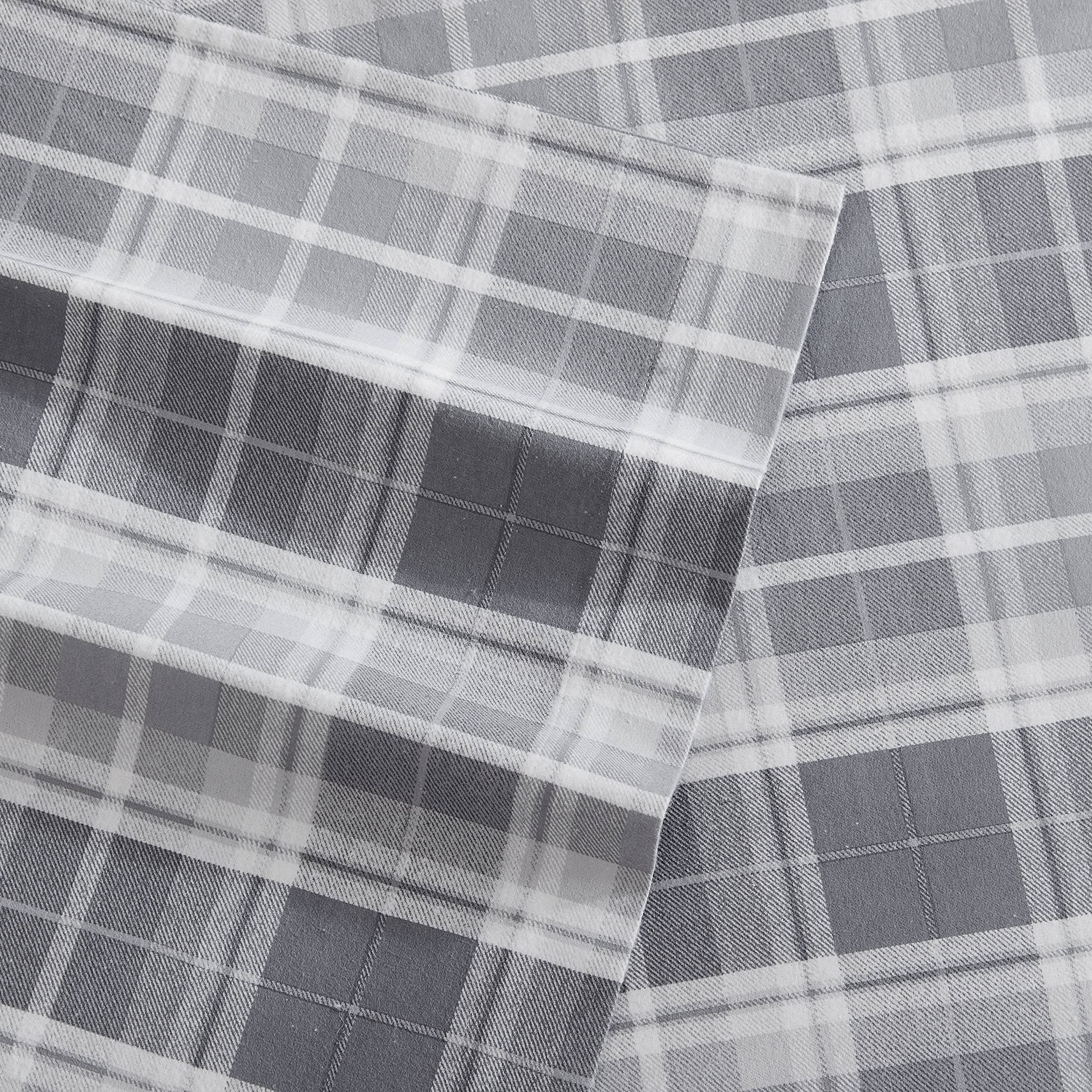 Laura Ashley plaid pattern repeat detail emphasizing classic design and visual depth