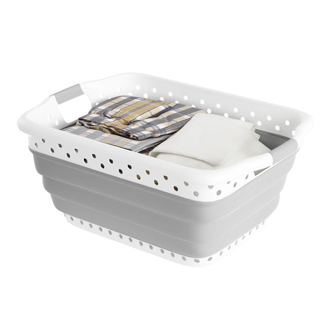 Lavish Home laundry basket in dorm room demonstrating tidy organization