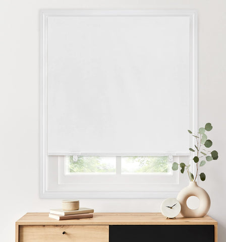 LazBlinds being trimmed to fit a window frame illustrating easy customization