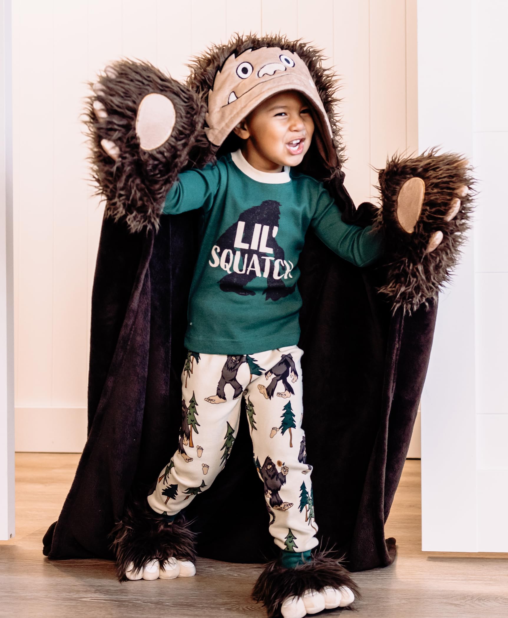 Lazy One Bigfoot laid flat with measurements showing generous size for kids