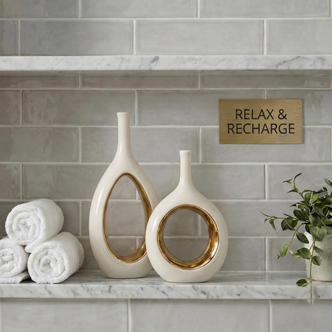 LCCCK vases with faux flowers on mantel, offers low-maintenance décor