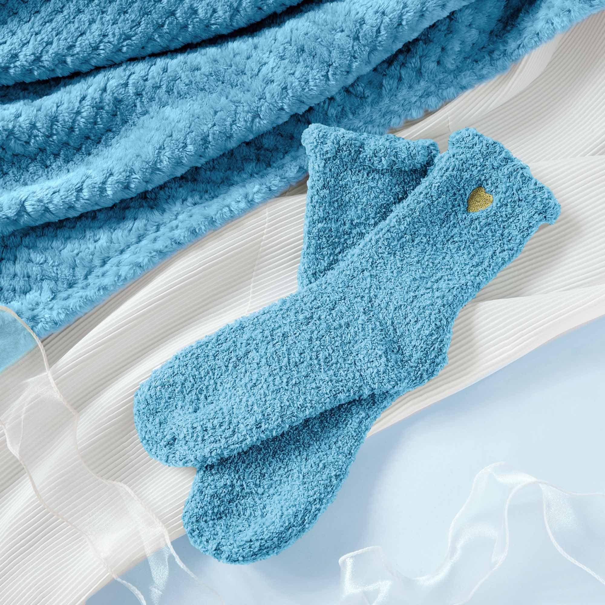 LE CADEAU fuzzy socks with dried flower gift card adding a personal thoughtful touch