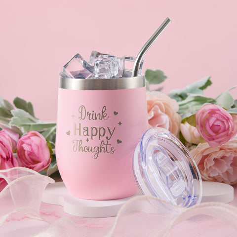 LE CADEAU rose-scented candle and bath products arranged for a calming spa benefit