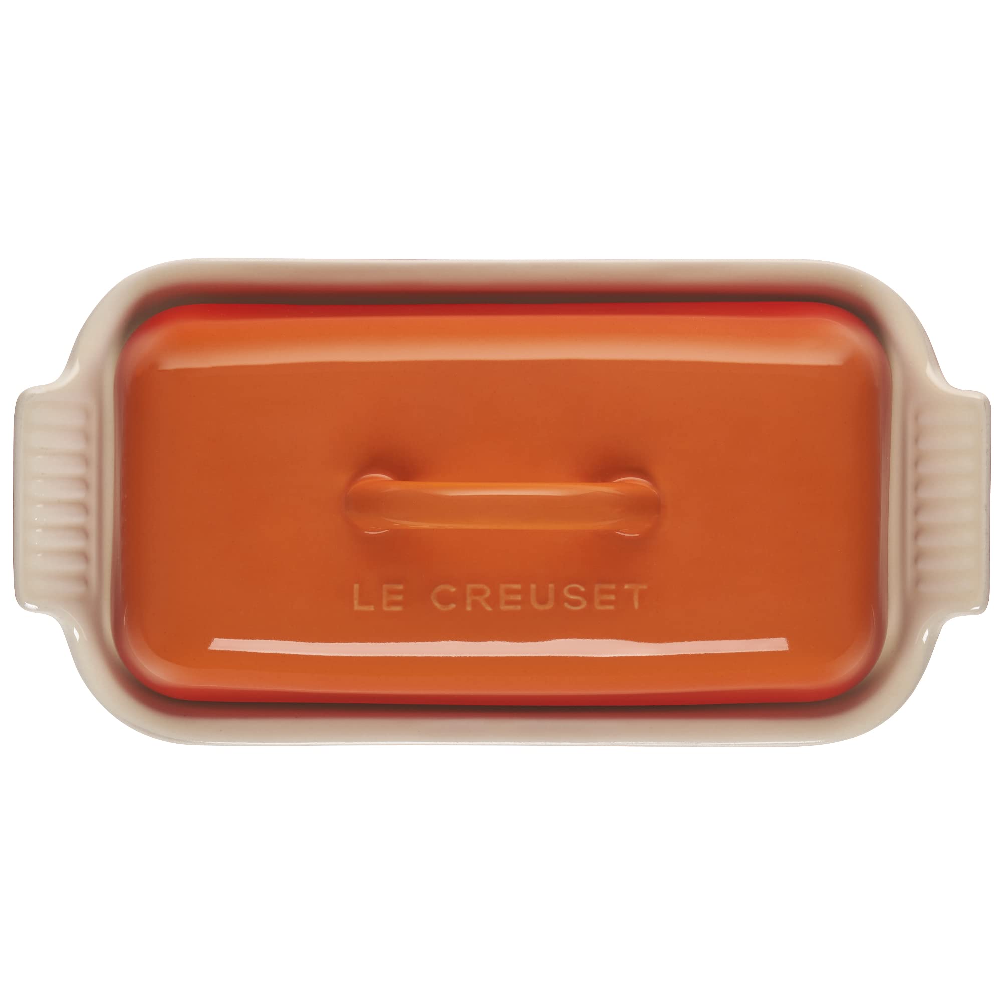 Le Creuset butter dish inside refrigerator demonstrating space-saving fit and odor protection