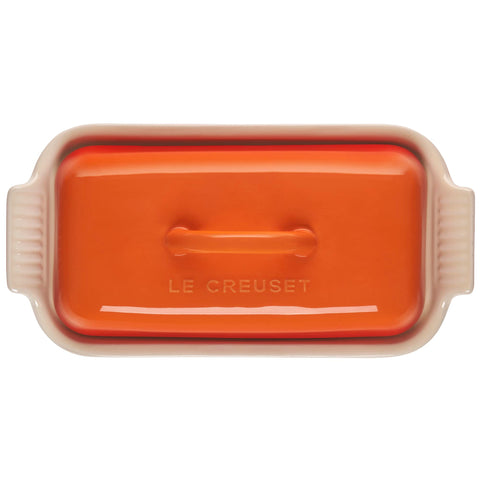 Le Creuset butter dish inside refrigerator demonstrating space-saving fit and odor protection