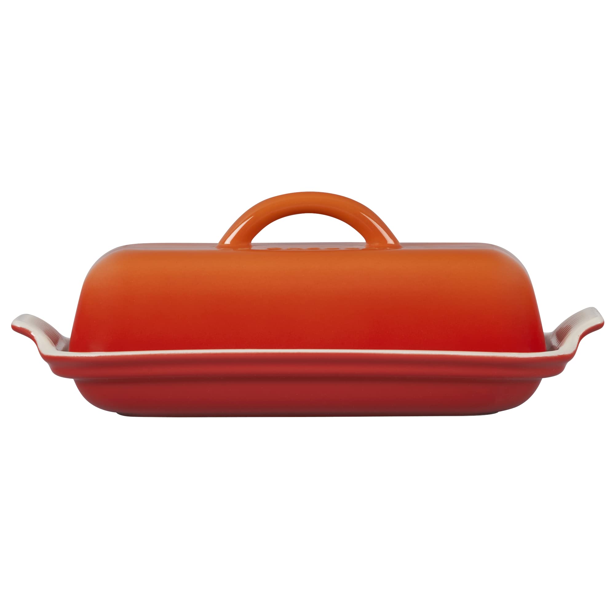 Le Creuset butter dish on breakfast table showing Flame glaze adding color to serving