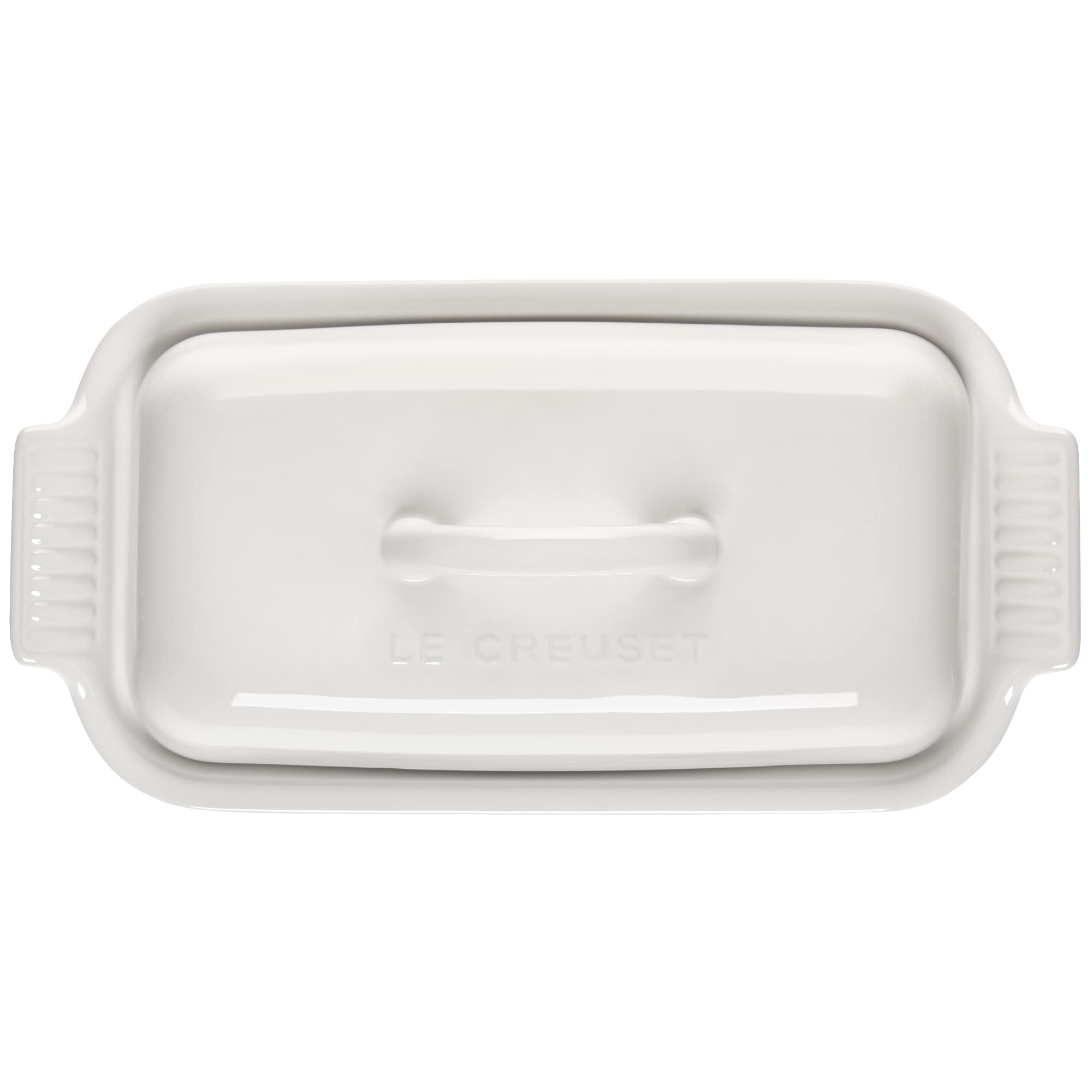 Le Creuset butter dish on table with bread demonstrating stylish serving and convenient use