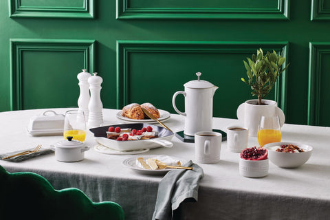 Le Creuset butter dish on table with spreader for attractive serving benefit