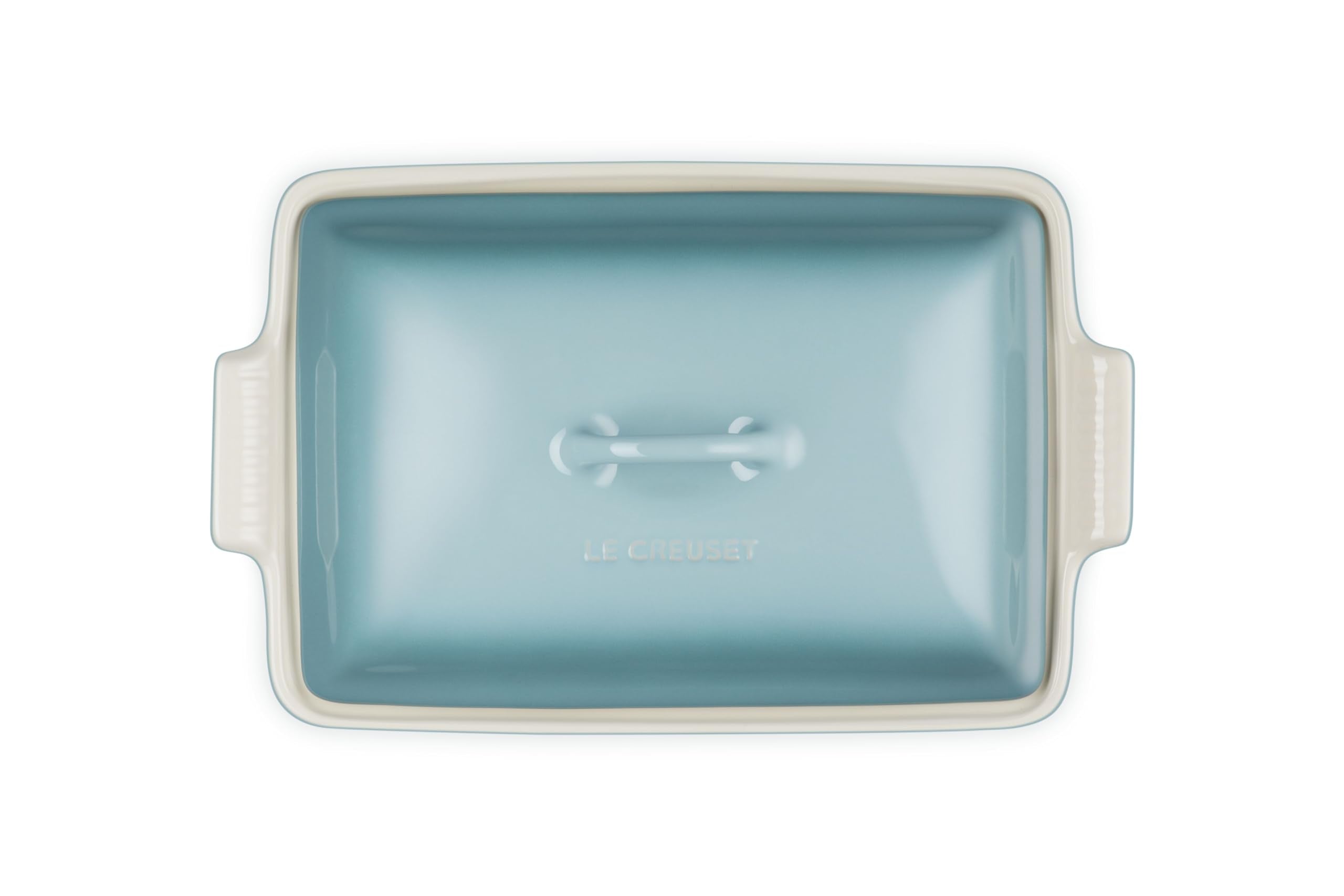 Le Creuset interior smooth enamel close-up showing nonstick release benefit for easy cleanup