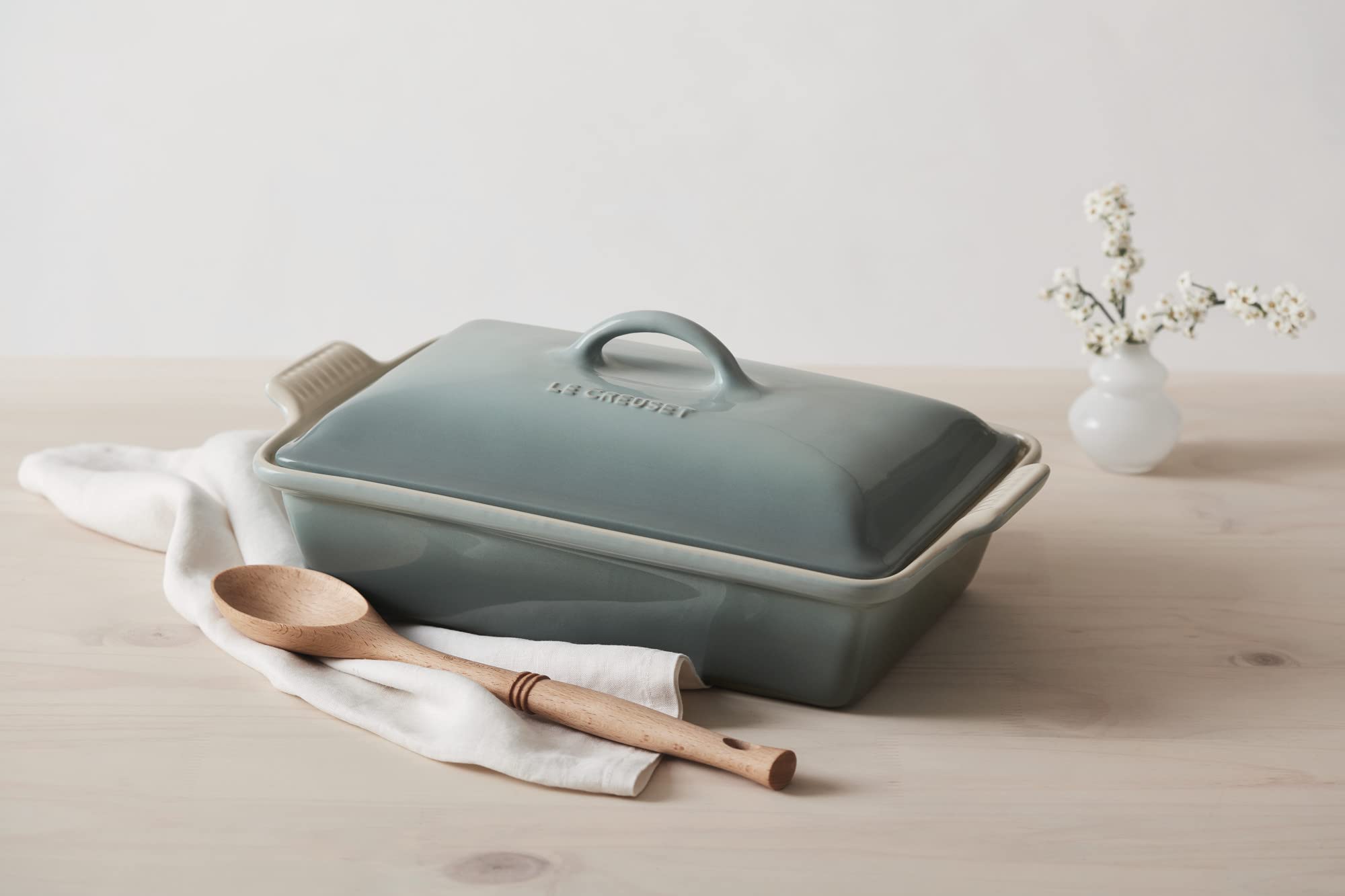 Le Creuset casserole on table with food showing attractive presentation and serving convenience