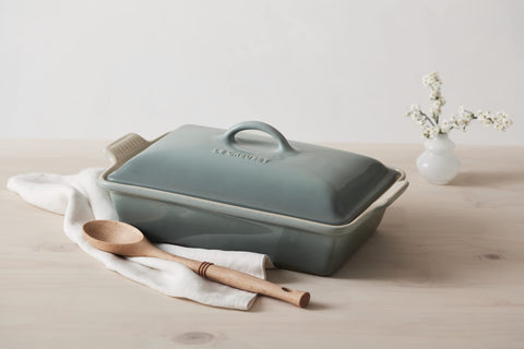 Le Creuset casserole on table with food showing attractive presentation and serving convenience