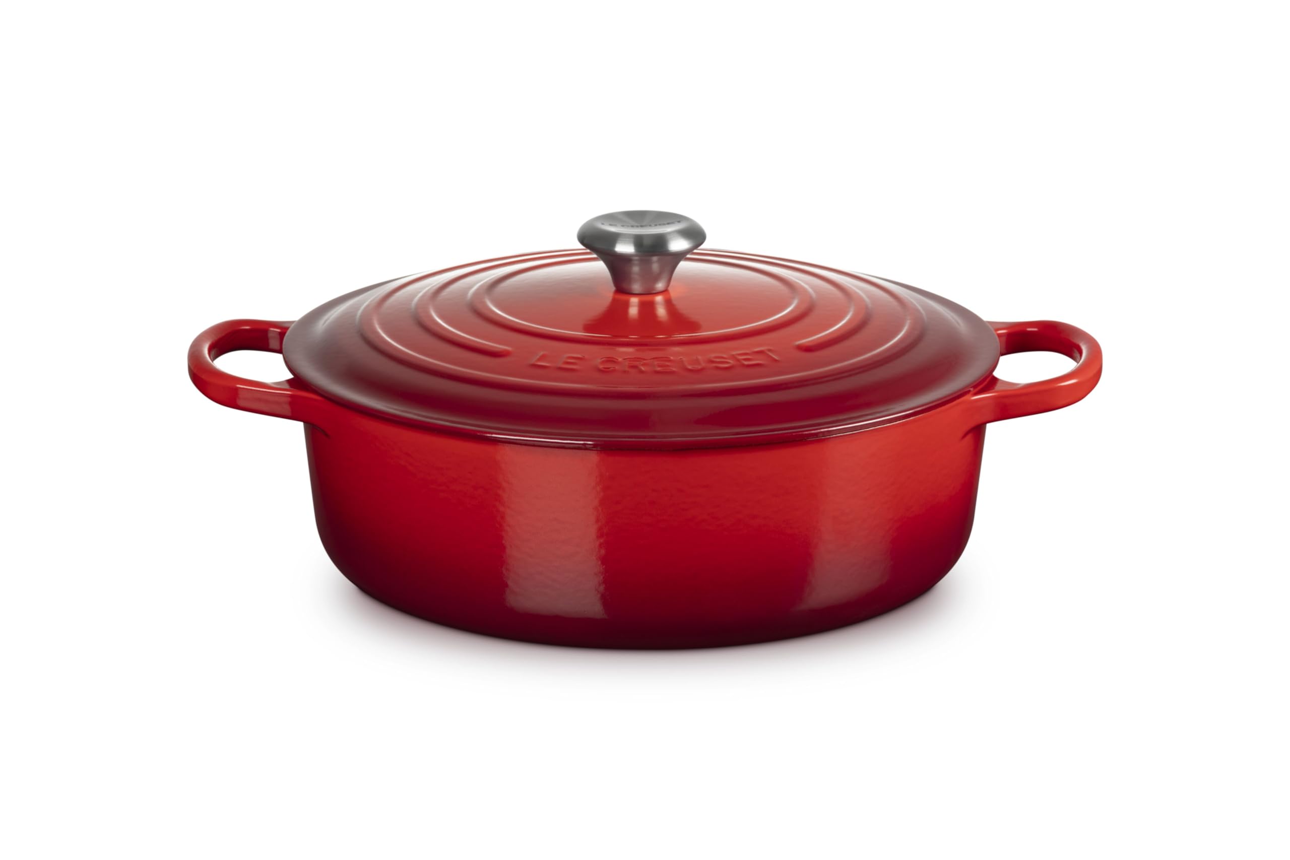 Le Creuset front view showing cerise enamel and sturdy handles for visual appeal